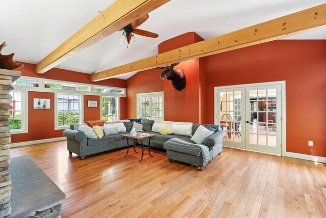 17 S Rd, Winthrop, ME 04364 - living area with french doors, light wood-type flooring, a ceiling fan, and baseboards