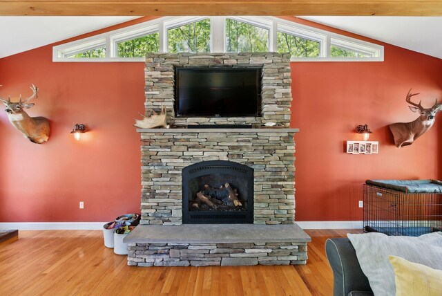 17 S Rd, Winthrop, ME 04364 - living area featuring lofted ceiling, baseboards, wood finished floors, and a fireplace