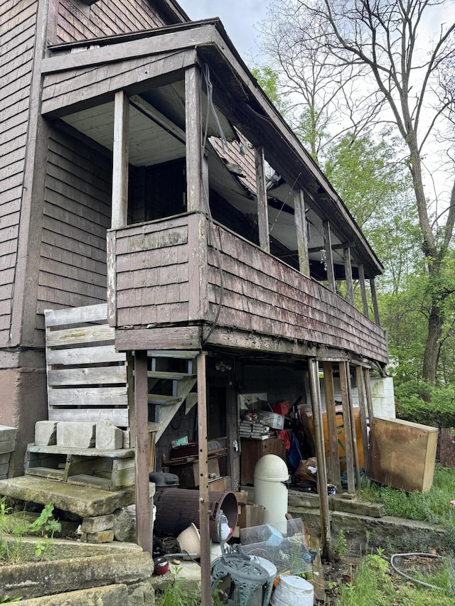 view of property exterior with stairs