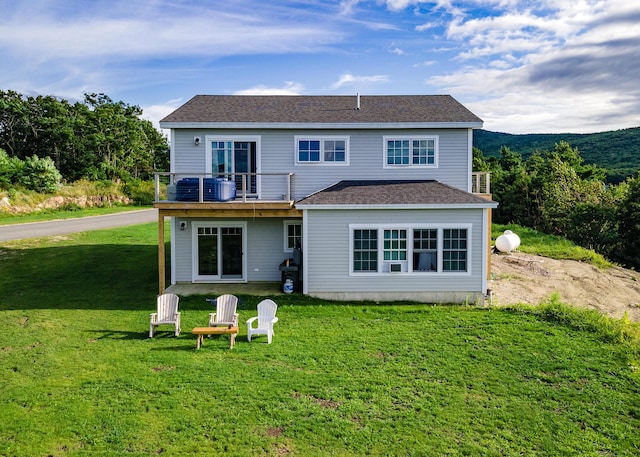 67 Hamilton Hill Way, Bar Harbor, ME 04609 - back of house with a balcony, a yard, and a shingled roof