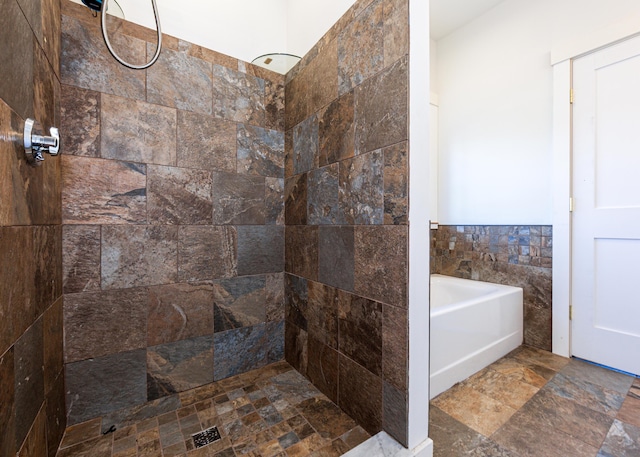 67 Hamilton Hill Way, Bar Harbor, ME 04609 - bathroom with tile walls, tiled shower, a bath, and stone finish flooring