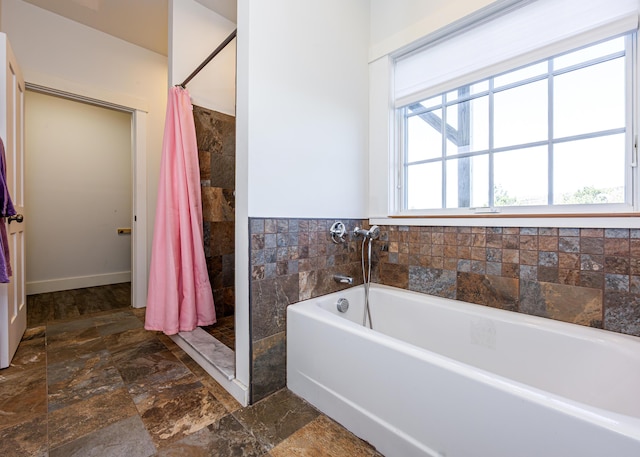 67 Hamilton Hill Way, Bar Harbor, ME 04609 - bathroom with stone finish flooring, a bath, and tiled shower