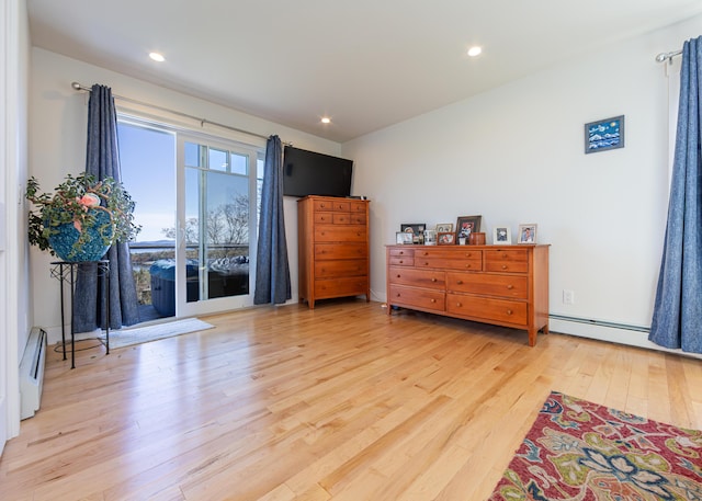 67 Hamilton Hill Way, Bar Harbor, ME 04609 - bedroom with wood finished floors, baseboard heating, and recessed lighting