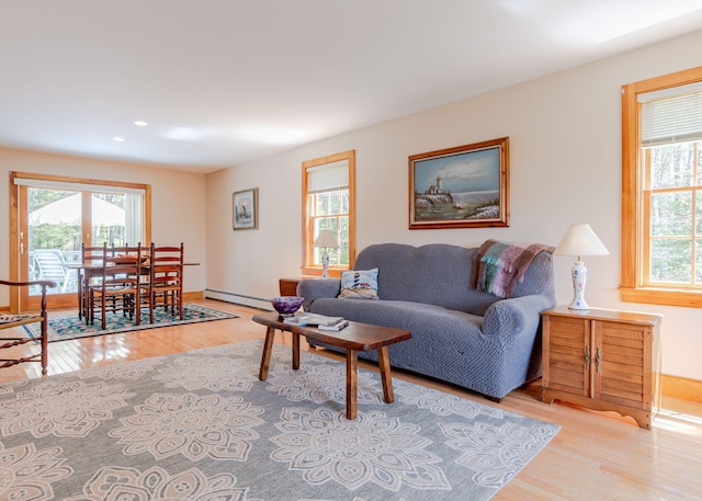 20 Ocean Side Ln, Bristol, ME 04554 - living area with healthy amount of natural light, wood finished floors, baseboard heating, and recessed lighting
