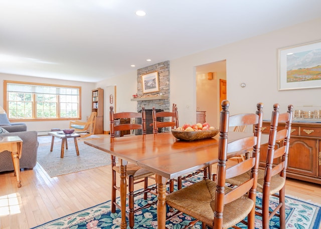 20 Ocean Side Ln, Bristol, ME 04554 - dining room with a fireplace, light wood finished floors, and recessed lighting