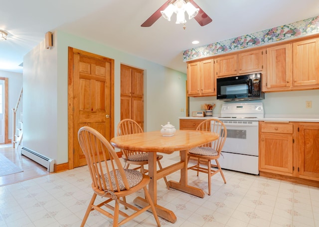 20 Ocean Side Ln, Bristol, ME 04554 - kitchen with black microwave, a baseboard radiator, electric range, light floors, and a ceiling fan