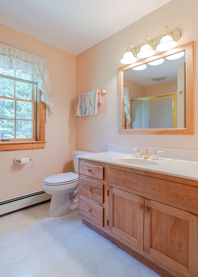 20 Ocean Side Ln, Bristol, ME 04554 - bathroom featuring a baseboard heating unit, vanity, an enclosed shower, and tile patterned floors