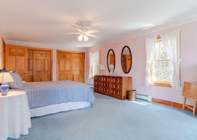 20 Ocean Side Ln, Bristol, ME 04554 - carpeted bedroom with baseboard heating, multiple closets, and a ceiling fan