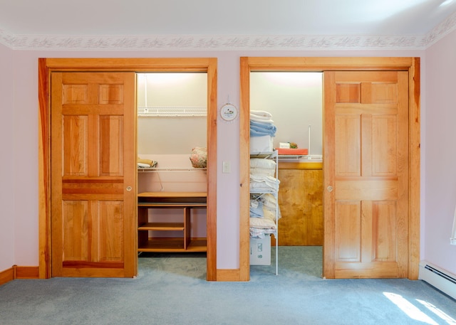 20 Ocean Side Ln, Bristol, ME 04554 - carpeted bedroom with a baseboard radiator and two closets