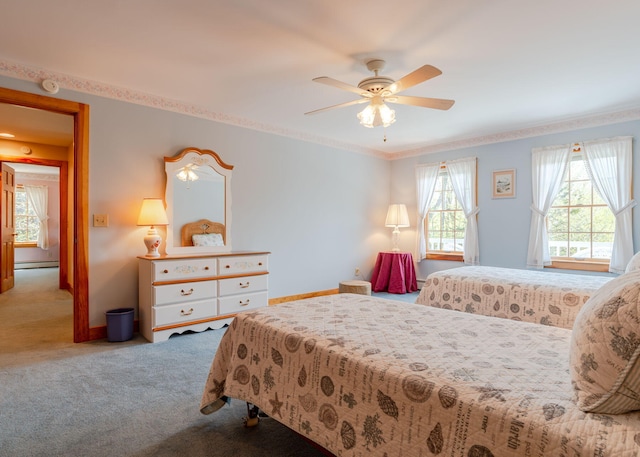 20 Ocean Side Ln, Bristol, ME 04554 - carpeted bedroom featuring ornamental molding, ceiling fan, and a baseboard heating unit