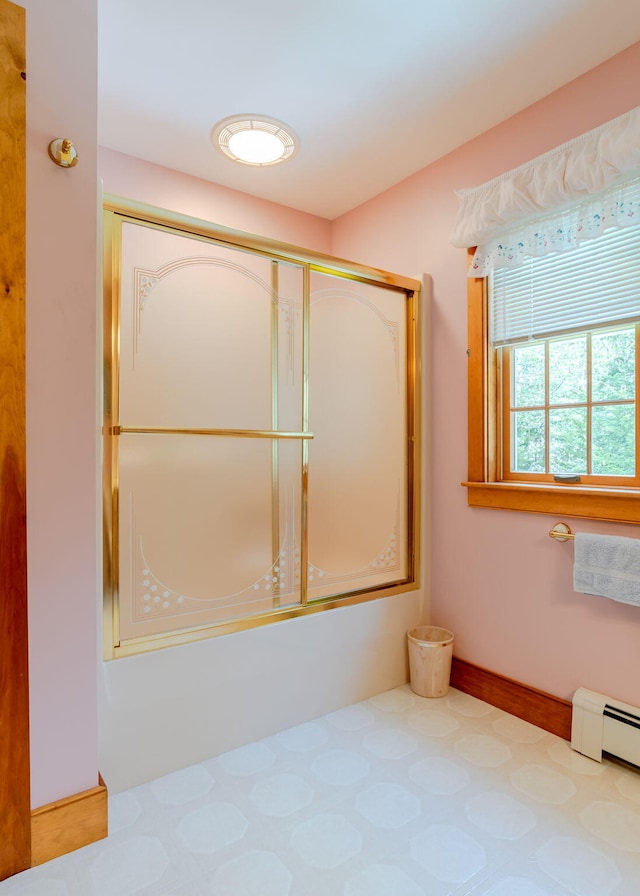 20 Ocean Side Ln, Bristol, ME 04554 - bathroom with baseboard heating and shower / bath combination with glass door