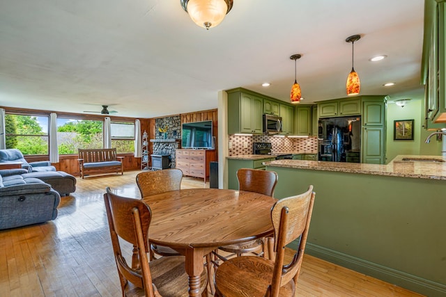 206 Sebago Lake Rd, Gorham, ME 04038 - dining space with light wood-type flooring, ceiling fan, recessed lighting, and baseboards
