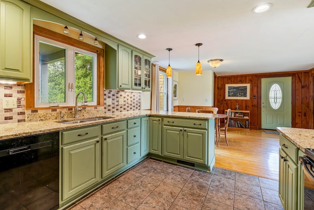 206 Sebago Lake Rd, Gorham, ME 04038 - kitchen featuring dishwasher, green cabinets, a sink, a peninsula, and tasteful backsplash