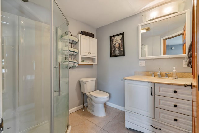 206 Sebago Lake Rd, Gorham, ME 04038 - bathroom featuring a stall shower, toilet, tile patterned floors, vanity, and baseboards
