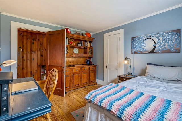 206 Sebago Lake Rd, Gorham, ME 04038 - bedroom with light wood-style floors and ornamental molding