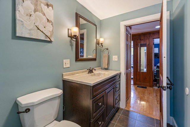 206 Sebago Lake Rd, Gorham, ME 04038 - bathroom with vanity, toilet, and tile patterned flooring