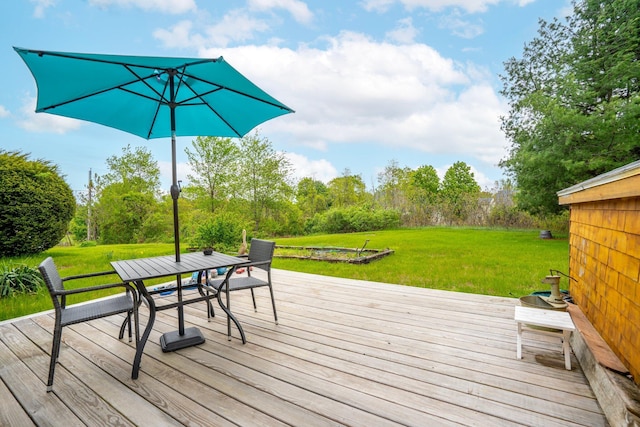 206 Sebago Lake Rd, Gorham, ME 04038 - wooden deck featuring outdoor dining area and a yard