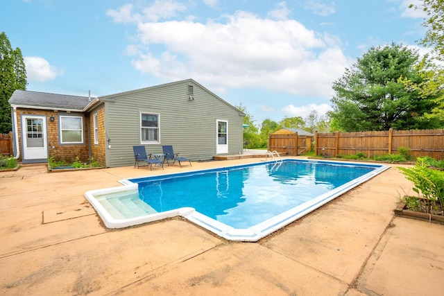 206 Sebago Lake Rd, Gorham, ME 04038 - view of swimming pool featuring a patio area and a fenced backyard