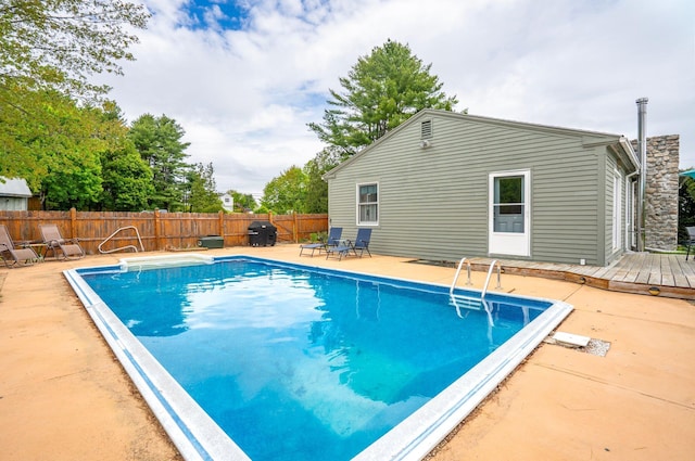 206 Sebago Lake Rd, Gorham, ME 04038 - view of swimming pool with a fenced backyard, a wooden deck, a grill, and a patio