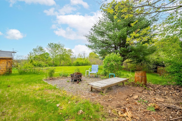 206 Sebago Lake Rd, Gorham, ME 04038 - view of grassy yard with a fire pit