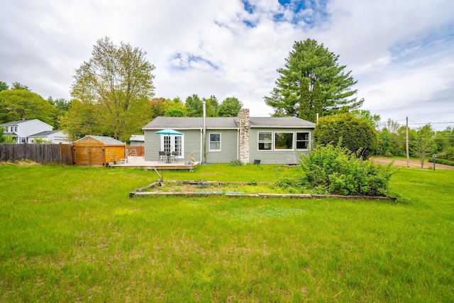 206 Sebago Lake Rd, Gorham, ME 04038 - back of house featuring a wooden deck and a chimney