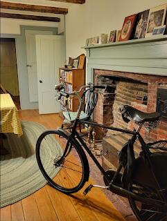 15 River Rd, Phillips, ME 04966 - detailed view of wood finished floors and a brick fireplace