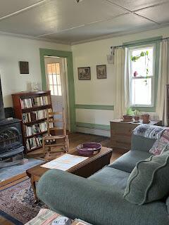15 River Rd, Phillips, ME 04966 - living area with a wood stove