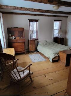 15 River Rd, Phillips, ME 04966 - bedroom featuring beamed ceiling