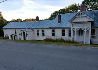 15 River Rd, Phillips, ME 04966 - view of front of house featuring a chimney