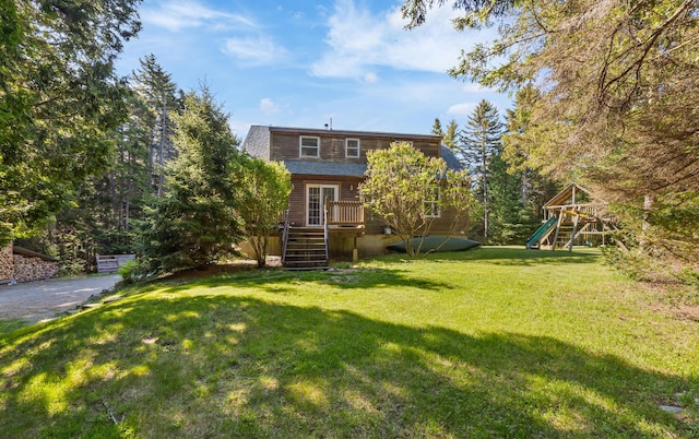 35 Salem Towne Rd, Southwest Harbor, ME 04679 - back of property with stairway, a playground, a yard, and a wooden deck