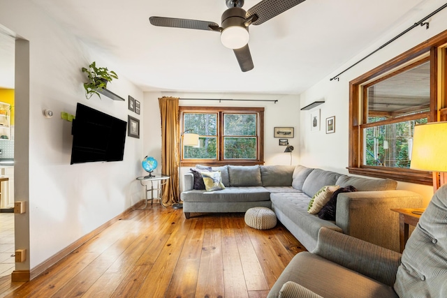 35 Salem Towne Rd, Southwest Harbor, ME 04679 - living room featuring healthy amount of natural light, ceiling fan, light wood finished floors, and baseboards