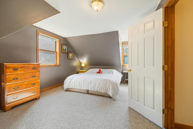 35 Salem Towne Rd, Southwest Harbor, ME 04679 - carpeted bedroom with baseboards and vaulted ceiling