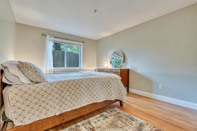 18 Smithwheel Rd Unit 21, Old Orchard Beach, ME 04064 - bedroom featuring baseboards and wood finished floors