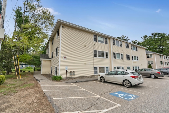 18 Smithwheel Rd Unit 21, Old Orchard Beach, ME 04064 - view of property featuring uncovered parking