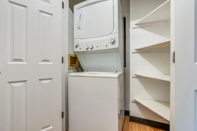 18 Smithwheel Rd Unit 21, Old Orchard Beach, ME 04064 - washroom with stacked washer / drying machine and light wood finished floors