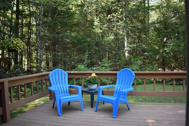 96 Pamela Dr, Winthrop, ME 04364 - wooden deck with a wooded view