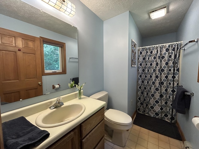 96 Pamela Dr, Winthrop, ME 04364 - full bathroom featuring vanity, toilet, a textured ceiling, curtained shower, and tile patterned flooring