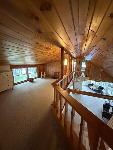 27 Chickadee Ln, Naples, ME 04055 - bonus room featuring wooden ceiling, carpet, vaulted ceiling, and wood walls
