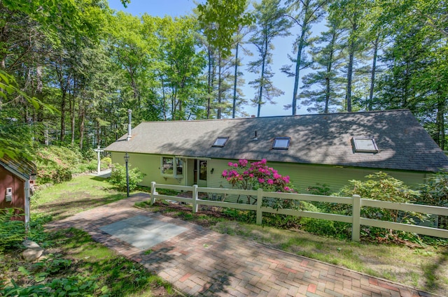 27 Chickadee Ln, Naples, ME 04055 - view of front of house with a shingled roof