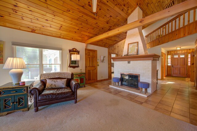 27 Chickadee Ln, Naples, ME 04055 - carpeted living area with a fireplace, high vaulted ceiling, tile patterned floors, and wooden ceiling
