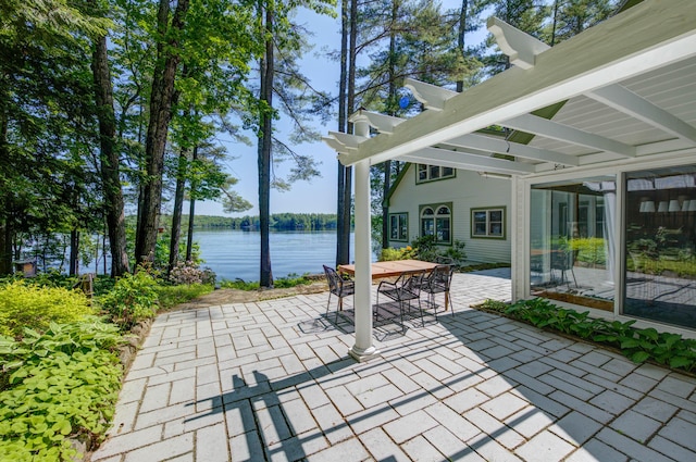 27 Chickadee Ln, Naples, ME 04055 - view of patio / terrace featuring a water view and outdoor dining area