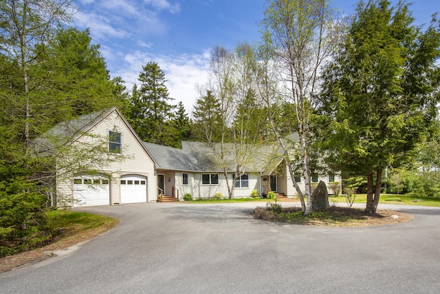 68 Parker Farm Rd, Mount Desert, ME 04660 - view of front facade featuring asphalt driveway and an attached garage