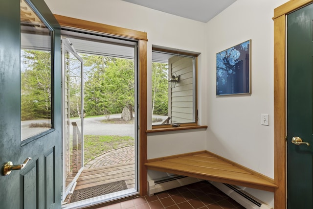 68 Parker Farm Rd, Mount Desert, ME 04660 - entryway featuring dark tile patterned floors and a baseboard heating unit