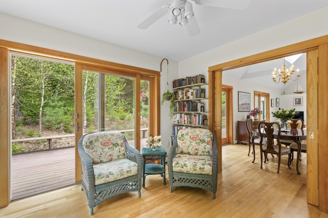 68 Parker Farm Rd, Mount Desert, ME 04660 - sitting room with ceiling fan, a chandelier, and light wood-style flooring