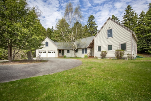 68 Parker Farm Rd, Mount Desert, ME 04660 - view of front facade featuring asphalt driveway, a garage, and a front yard