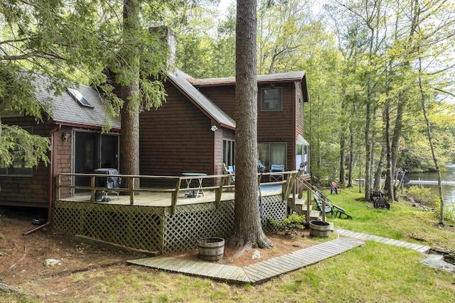 711 Biscay Rd, Bremen, ME 04551 - rear view of house with a deck and a yard