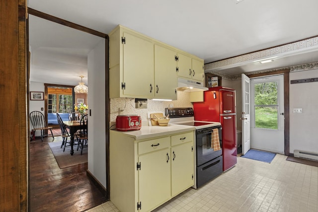 711 Biscay Rd, Bremen, ME 04551 - kitchen with range with electric cooktop, cream cabinets, under cabinet range hood, light countertops, and decorative backsplash
