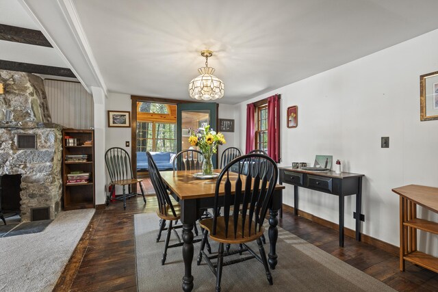 711 Biscay Rd, Bremen, ME 04551 - dining room featuring wood-type flooring, baseboards, and a chandelier