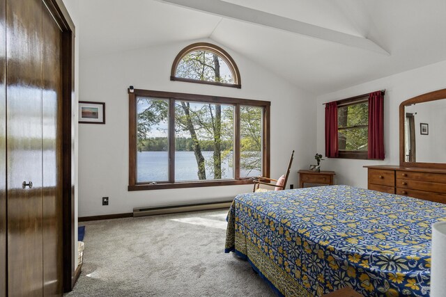 711 Biscay Rd, Bremen, ME 04551 - bedroom with carpet, vaulted ceiling, a baseboard radiator, baseboards, and a water view