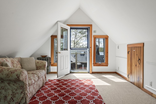 711 Biscay Rd, Bremen, ME 04551 - bonus room with vaulted ceiling, baseboards, and light colored carpet
